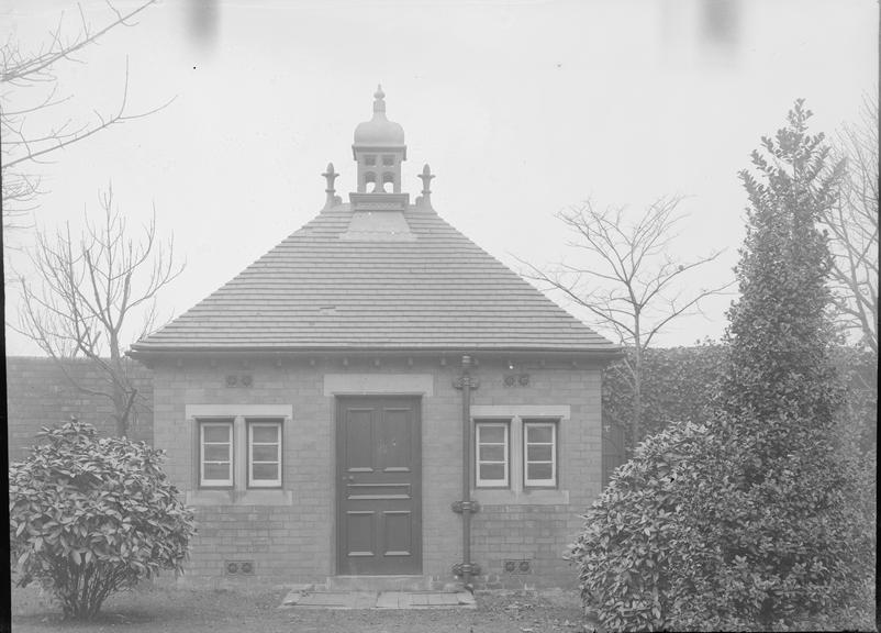 Works photographic negative of substation exterior in park