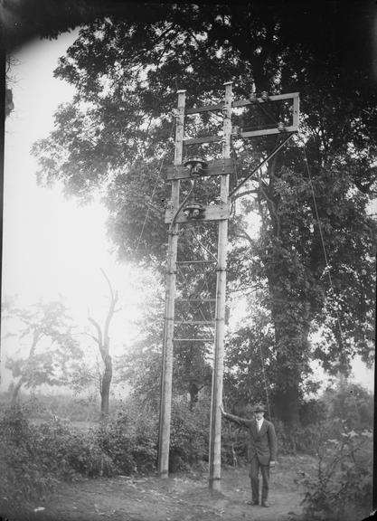 Works photographic negative of junction boxes feeding overhead