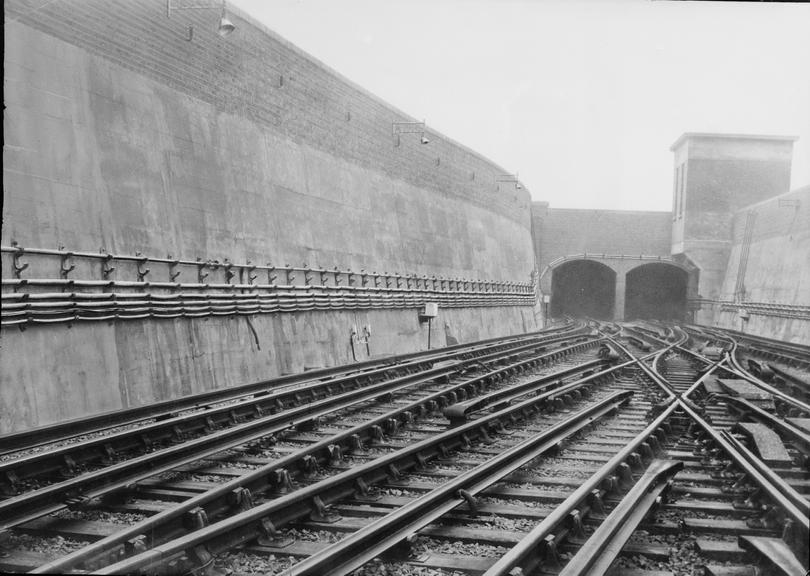 Works photographic negative of trackside cable runs, Morden