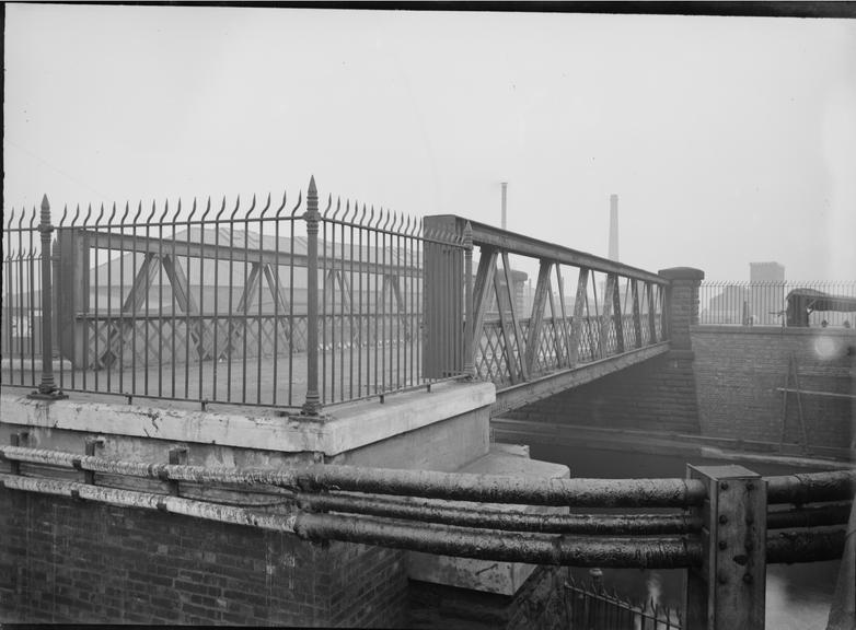 Works photographic negative of cables on canal footbridge