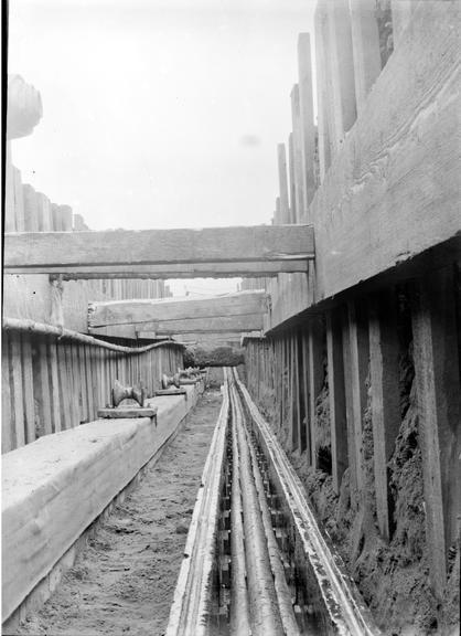 Works photographic negative of cable laid in trench