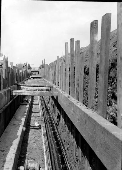 Works photographic negative of cable in trench, Trafford Park