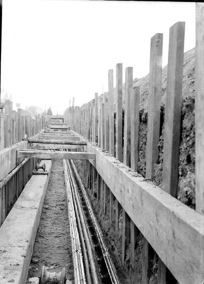 Works photographic negative of cable in trench, Trafford Park