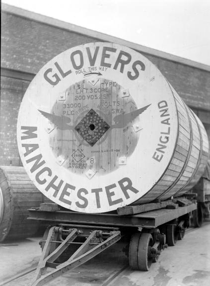 Works photographic negative of cable drum on trailer