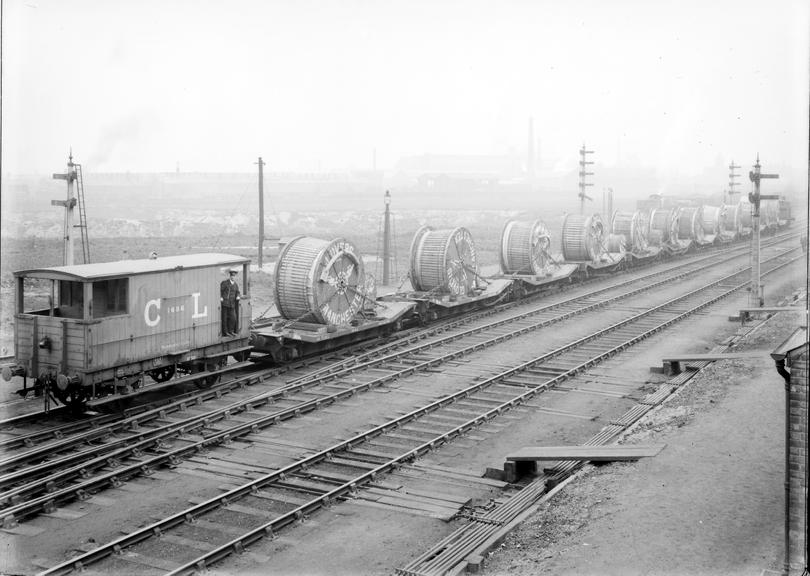 Works photographic negative of train load of Glover's drums