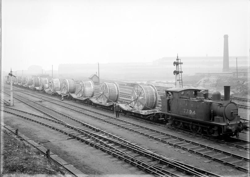 Works photographic negative of train load of Glover's drums