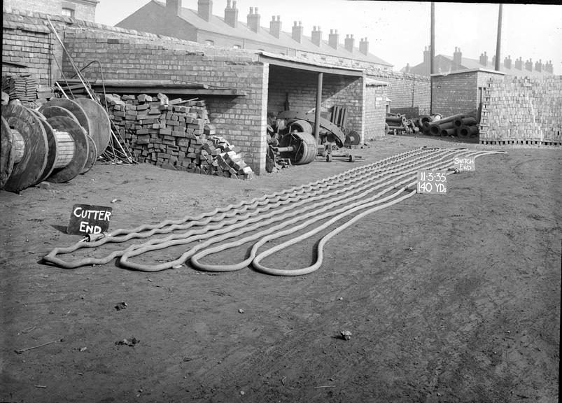 Works photographic negative of trailing cable