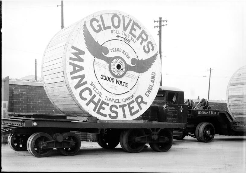 Works photographic negative of cable drum on bogie trailer