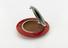 Circular powder compact with red urea formaldehyde base and