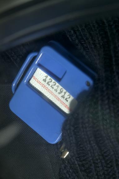 Blue film badge made by Ever Ready Tool and Plastic Co