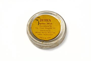 Tin containing wick for Jetex rocket motor