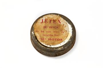 Tin containing wick for Jetex rocket motor