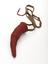 Curved animal horn encased in red cloth with cotton sling