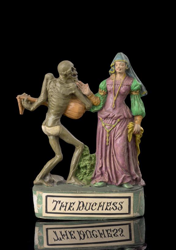 Plaster statue of cadaver with lute escorting Duchess