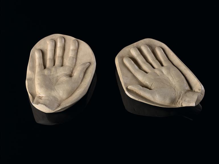 Plaster plaques of a pair of male hands, English, 1920-1930