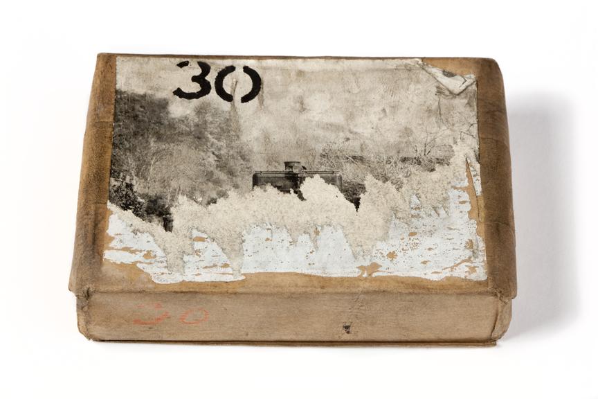 A printing block with a surface image of a locomotive