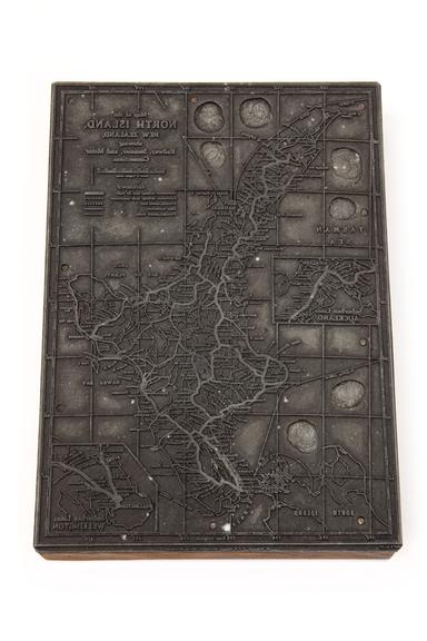 A printing block with a surface image map of the north island