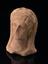 Votive male head, terracotta, hollow, open at base