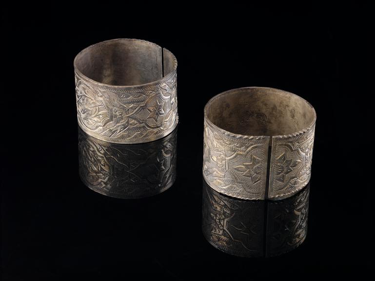 Pair of silver anklets, penannular, engraved decoration