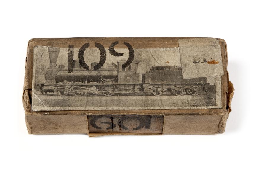 A printing block with a surface image of a locomotive