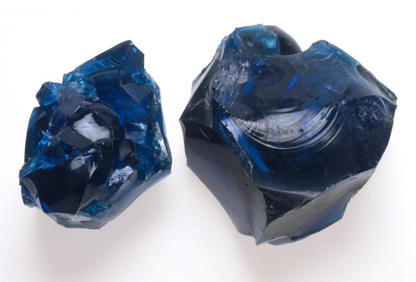 Two pieces of blue flint glass cullet, 1968