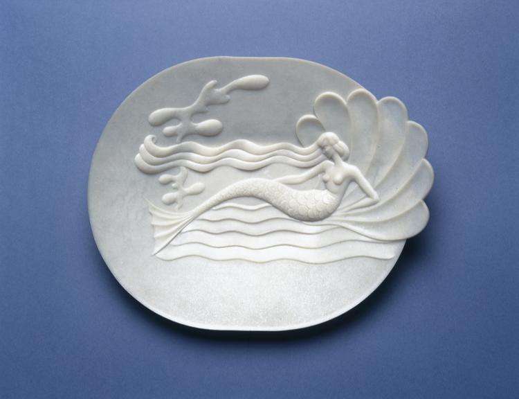 Oval moulded plastic serving dish decorated with mermaid