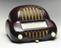 Walnut bakelite radio, with ivory phenolic knobs, valve