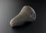 Solid bell-shaped stone pestle with rounded grinding end