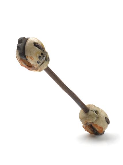 2 penis pins of brass with decorative bone end-pieces | Science Museum Group Collection