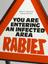 Rabies warning sign and stand, England, 1980-1990