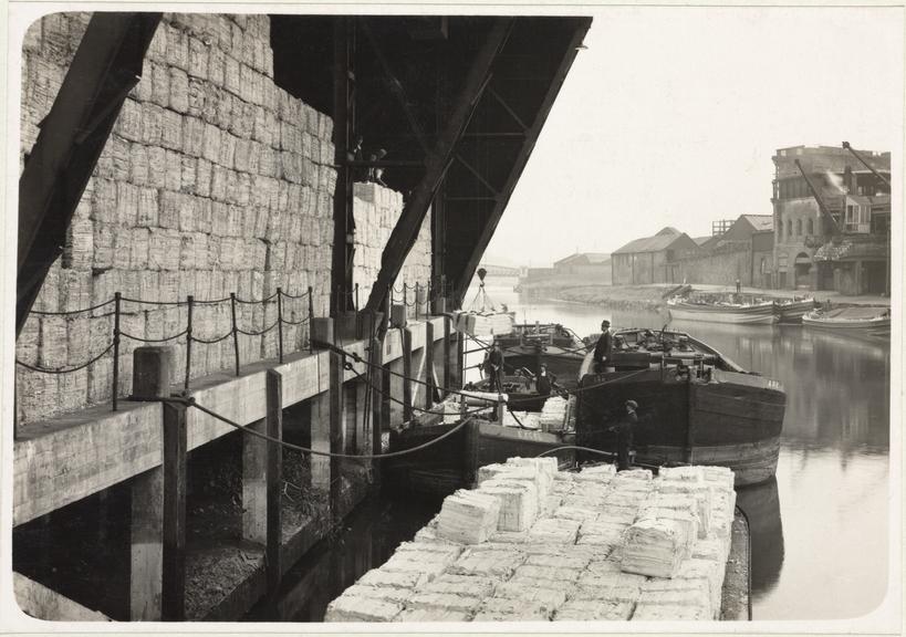 16 photographs of paper and board-making machinery and processes