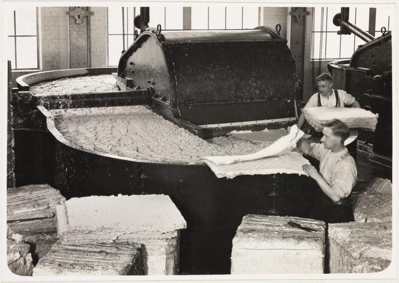 16 photographs of paper and board-making machinery and processes