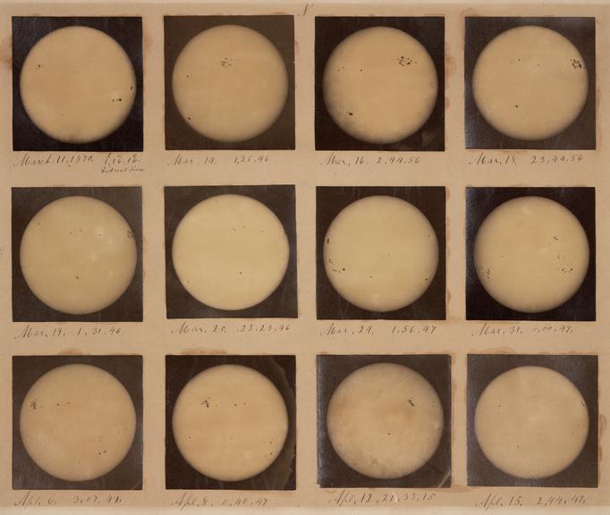 Mounted photographs of the Sun