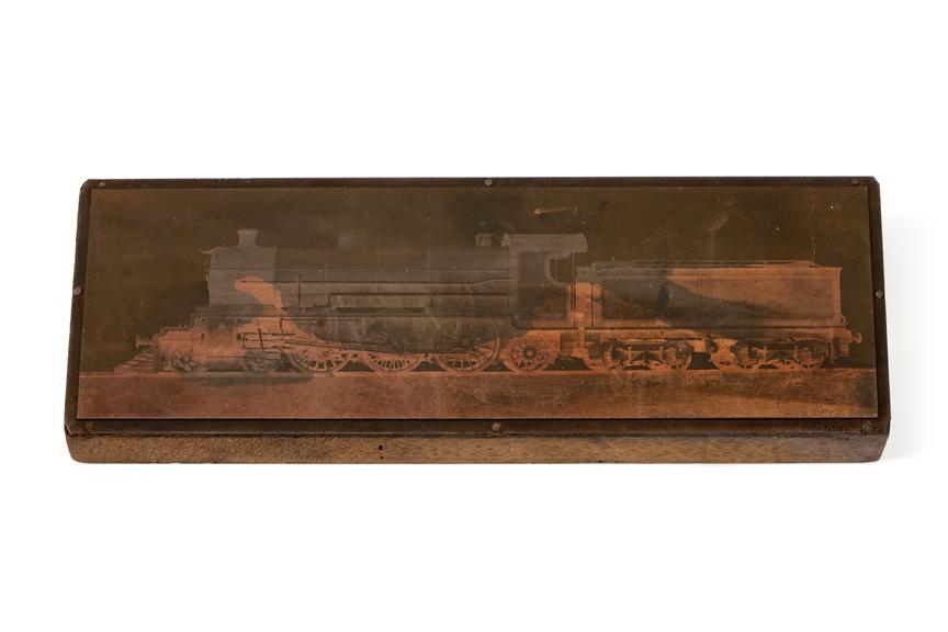 A printing block with a surface image of a locomotive