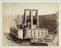 Albumen photograph: dredger in dry dock for damage inspection