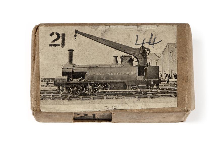 A printing block with a surface image of a crane locomotive, no