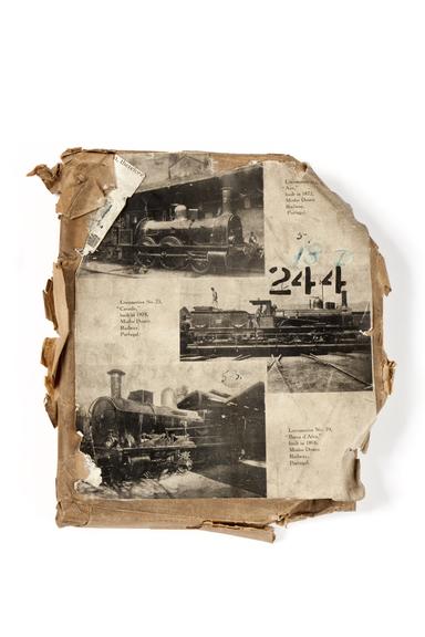 A printing block with three surface images of locomotives used