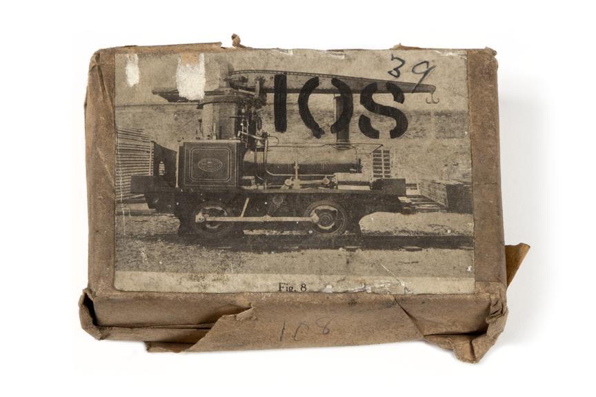 A printing block with a surface image of a locomotive