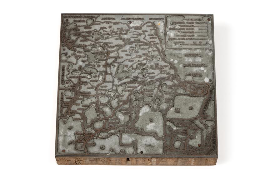 A printing block with a surface image of the Belgian Congo and