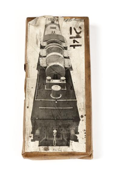 A printing block with a surface image of a locomotive