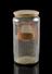 Glass drug jar, with parchment lid