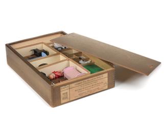 Box containing miniature toys for psychometric test