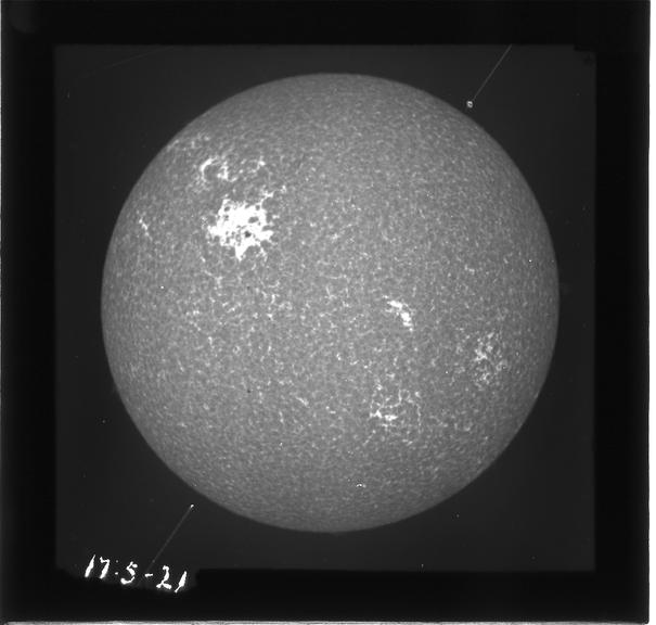 Glass slides of solar spectrums, solar prominences and observatory equipment