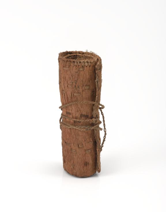 tobacco cloth rolls Bark cloth roll containing two dried leaves of tobacco