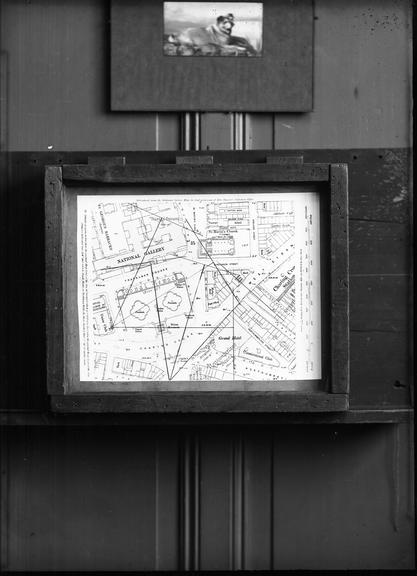 A glass slide image showing a map of Trafalgar Square