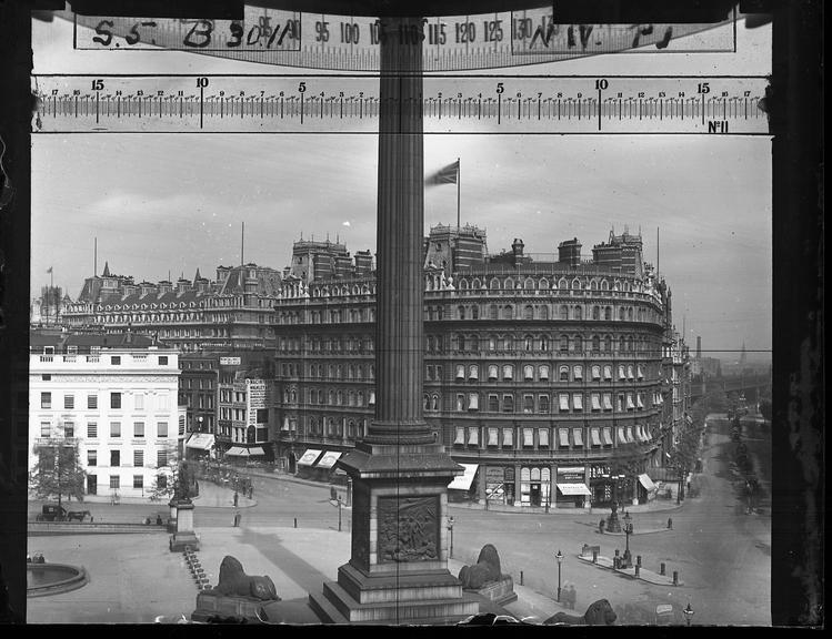 A glass plate negative of a view across Trafalgar Square