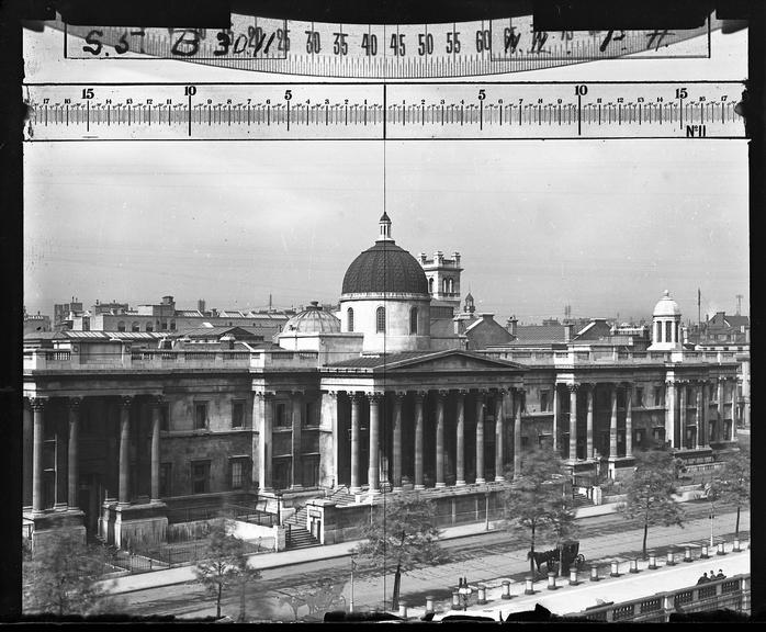 A glass plate negative of a view across Trafalgar Square