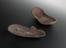 Pair of hide sandals, with incised geometric design