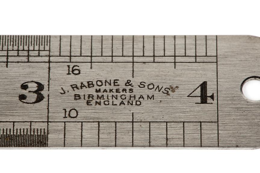 A 4-inch steel rule, made by J. Rabone & Sons.