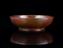 Shallow moulded mottled bowl on foot, Bakelite plastic